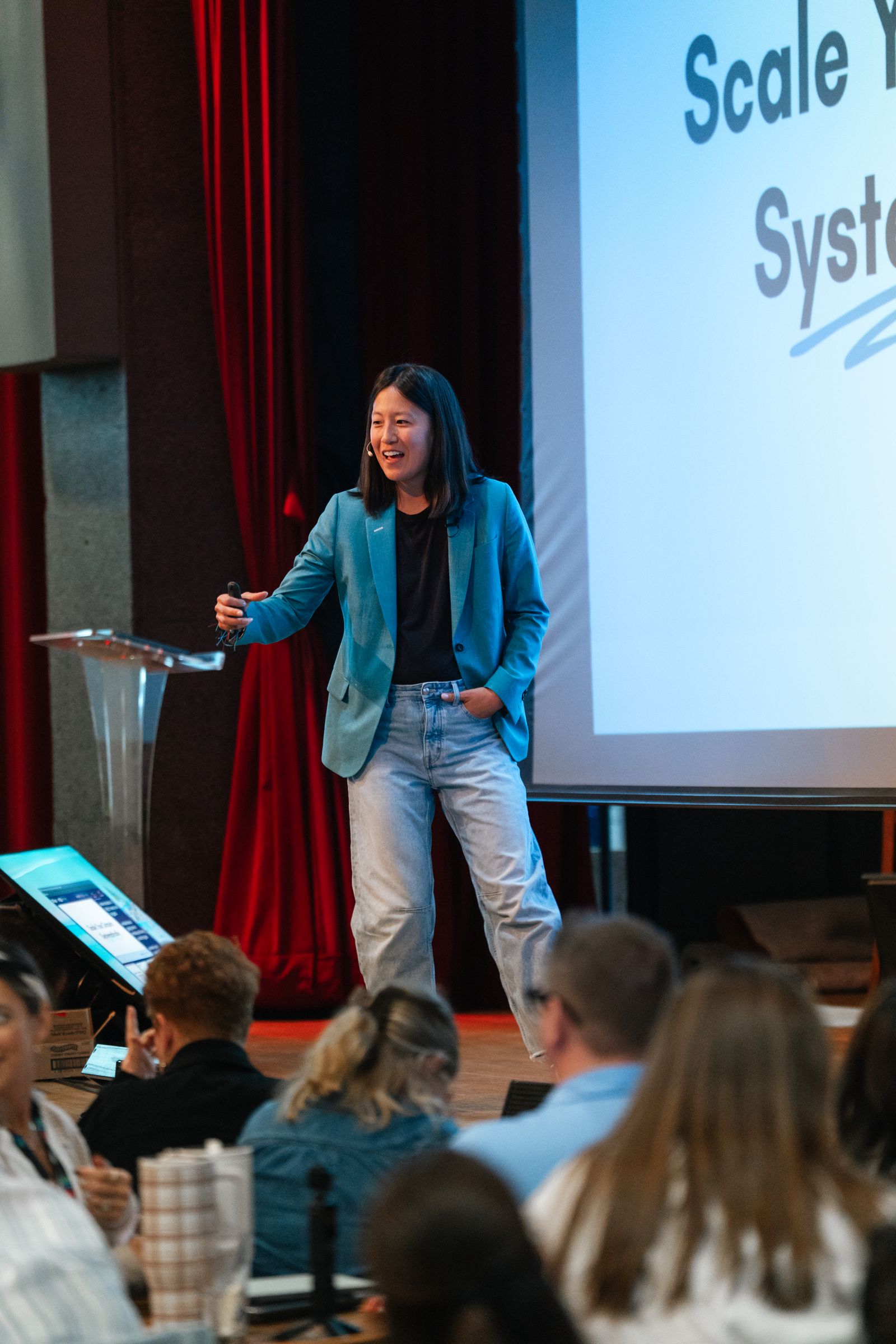 Katie Day speaking on stage